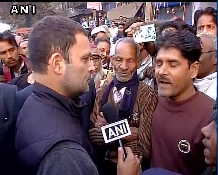 Congress VP Rahul Gandhi meets people outside ATM