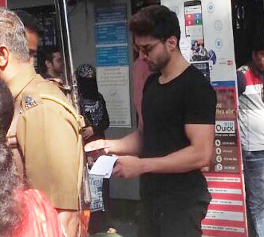 Gurmeet Choudhary SPOTTED in a queue outside Bank