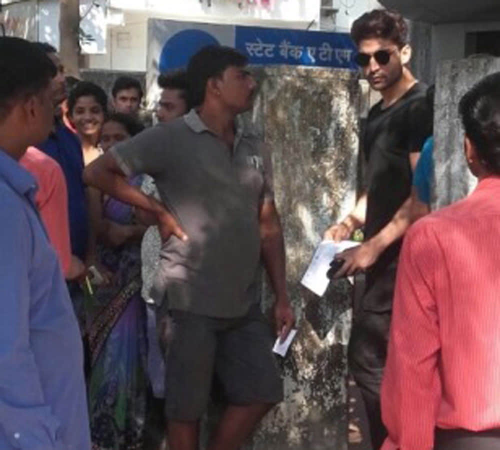 Gurmeet Choudhary SPOTTED in a queue outside Bank