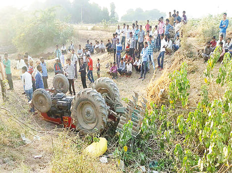 Tractor overturned, driver killed