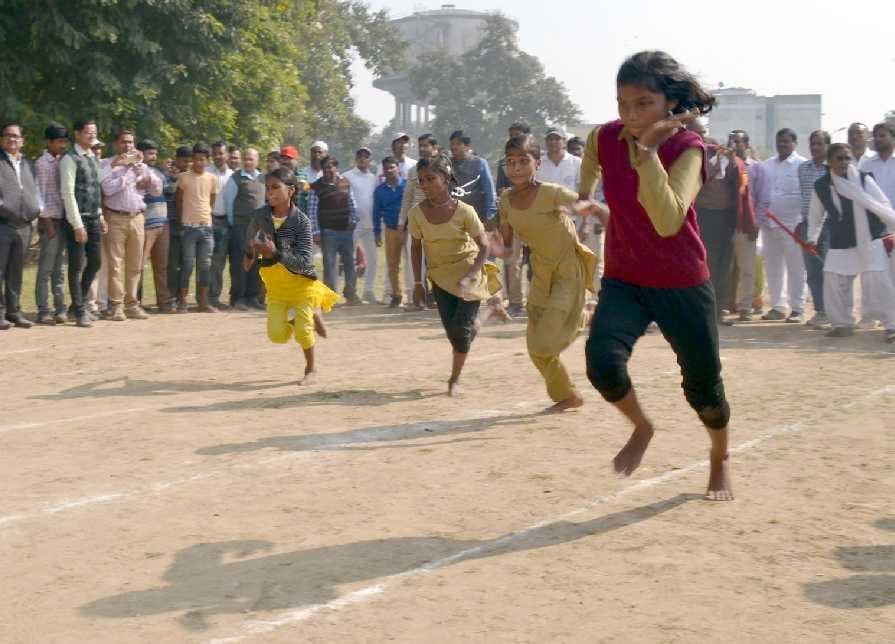 Participants ran barefoot on the track, flying dust