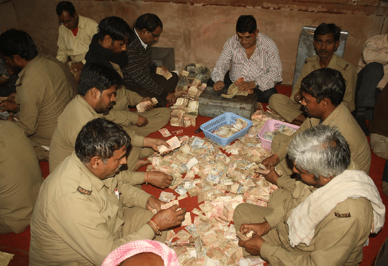 foreign currency and jewelery found in Bankebihari's piggy bank