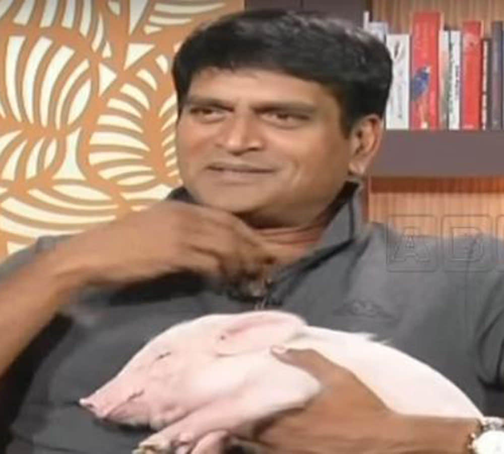 south indian star ravi babu with his piglet