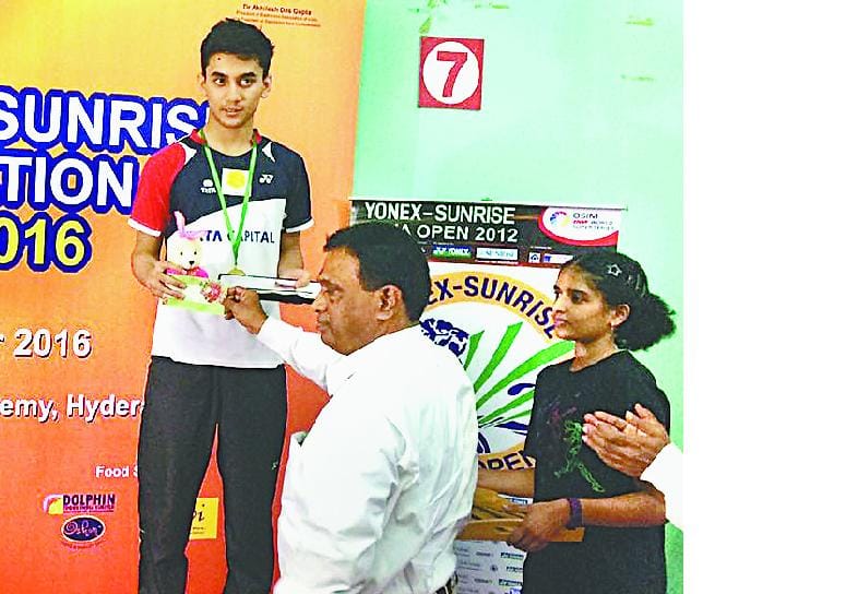 India International's singles title was won by the set targe