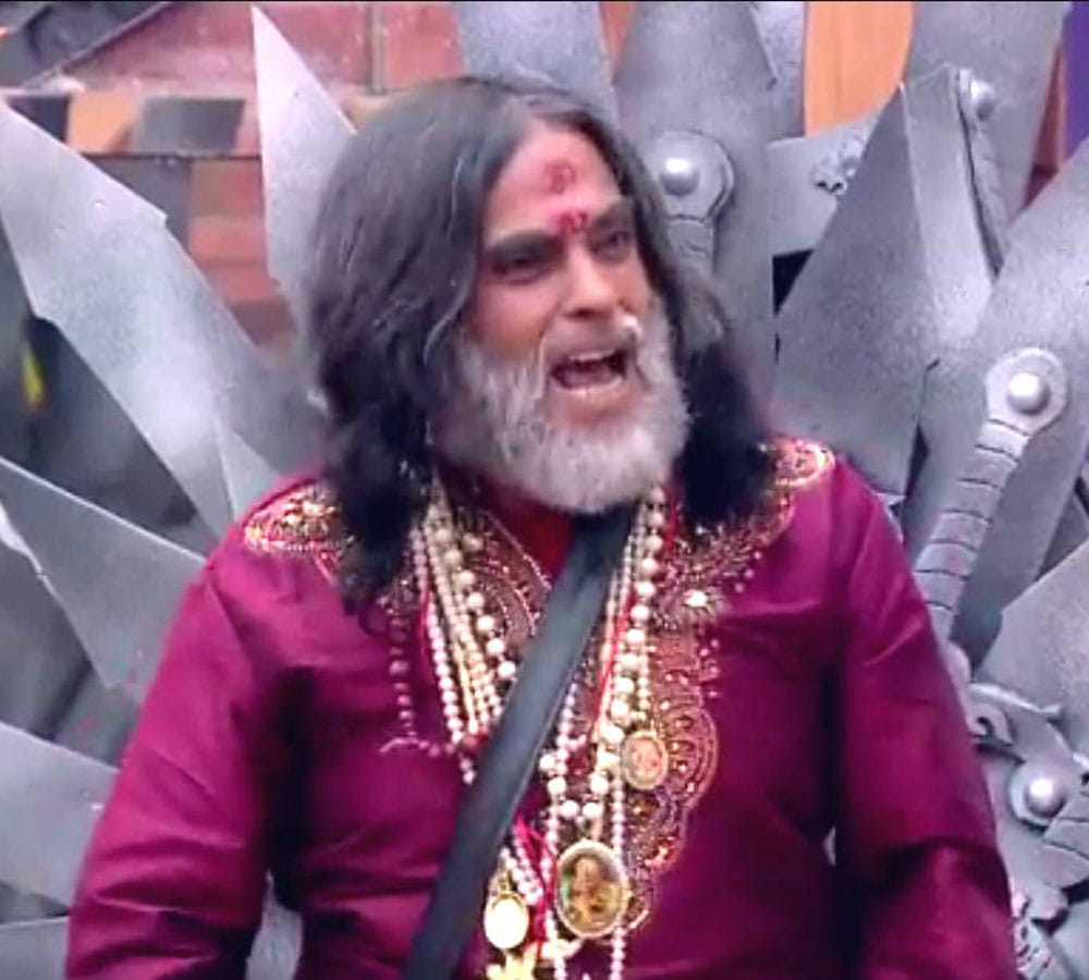 rakha sawant to make nude swami om
