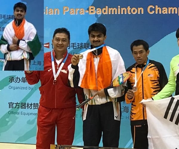 Azamgarh district magistrate wins medal in badminton.