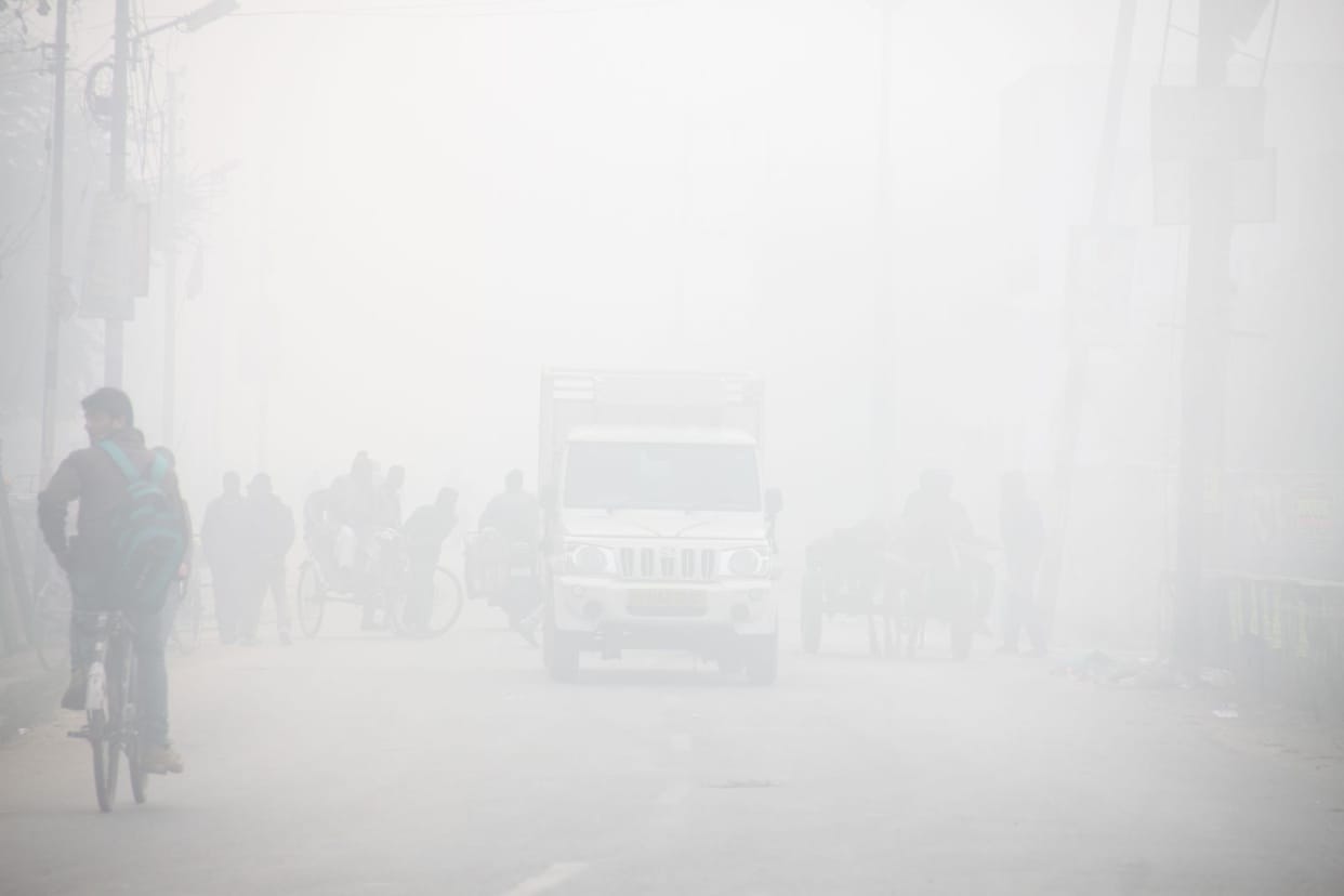 torpid city in dense fog