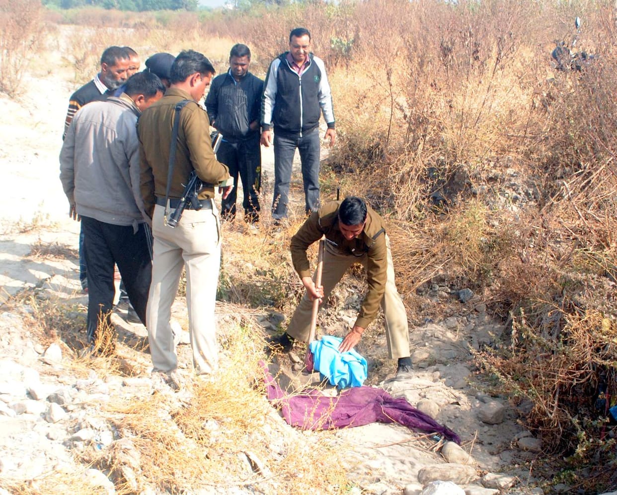 Newborn's body buried in the ground