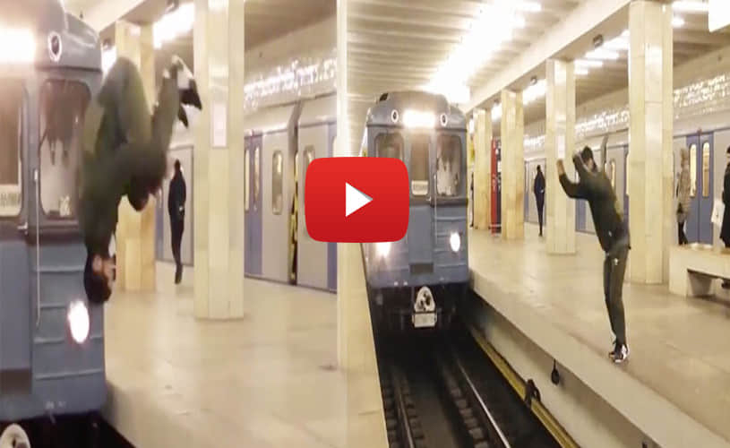 man jump across platform in front of speeding train
