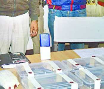 Five pistols, two revolvers, including the three smugglers arrested
