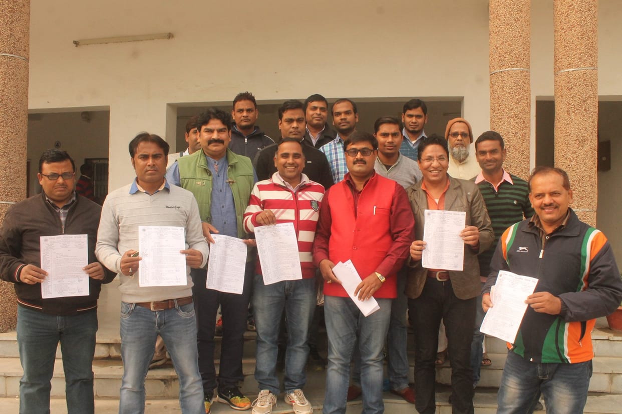 DIOS surrounded by faculty