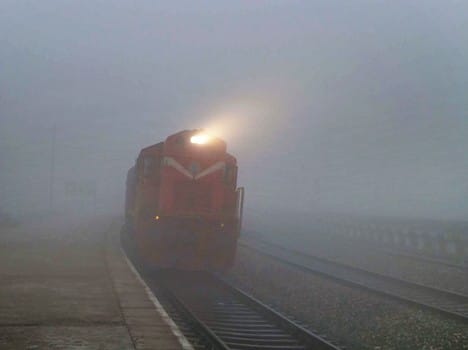 fog sheet stretched in front of trains