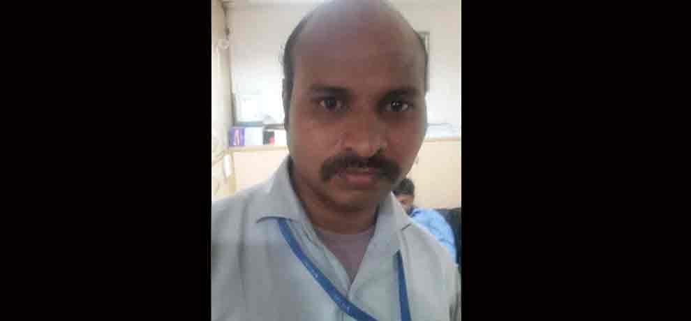 man standing in que to get cash for last rituals  din not got money