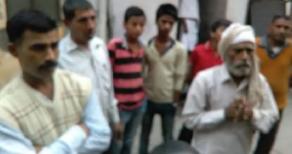 wife died due to cancer and husband has no money for funeral, standing out bank in line