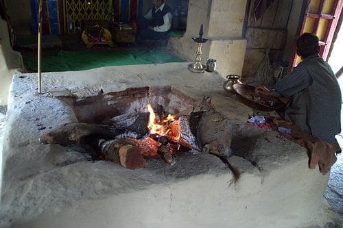 fire is burning in the temple from three eras