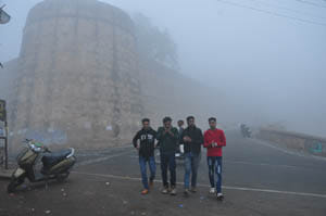 Wrapped in a blanket of fog city, grew cold