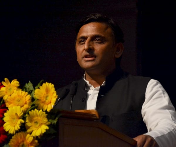  Akhilesh Yadav distributes laptops to students.
