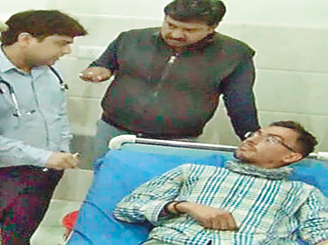 Two foreign tourists injured bike rider car collision