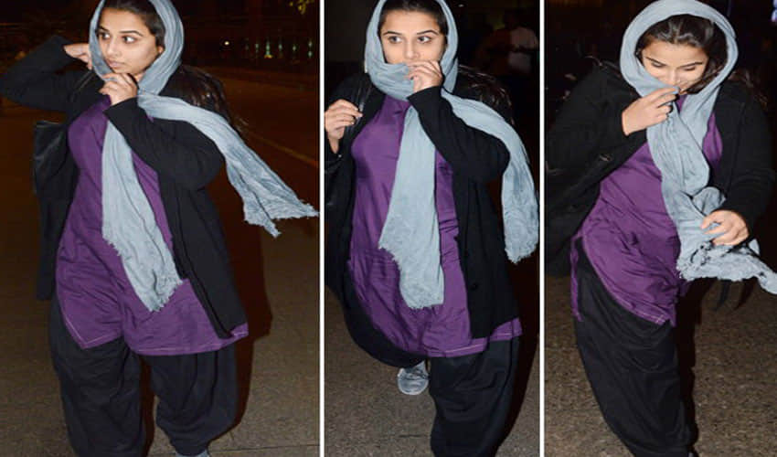 vidya balan hide her face in front of camera