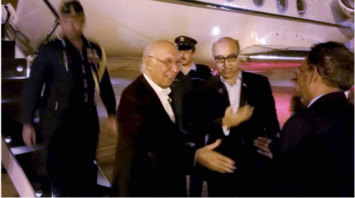 Aziz exchanges pleasantries with Modi, talks uncertain