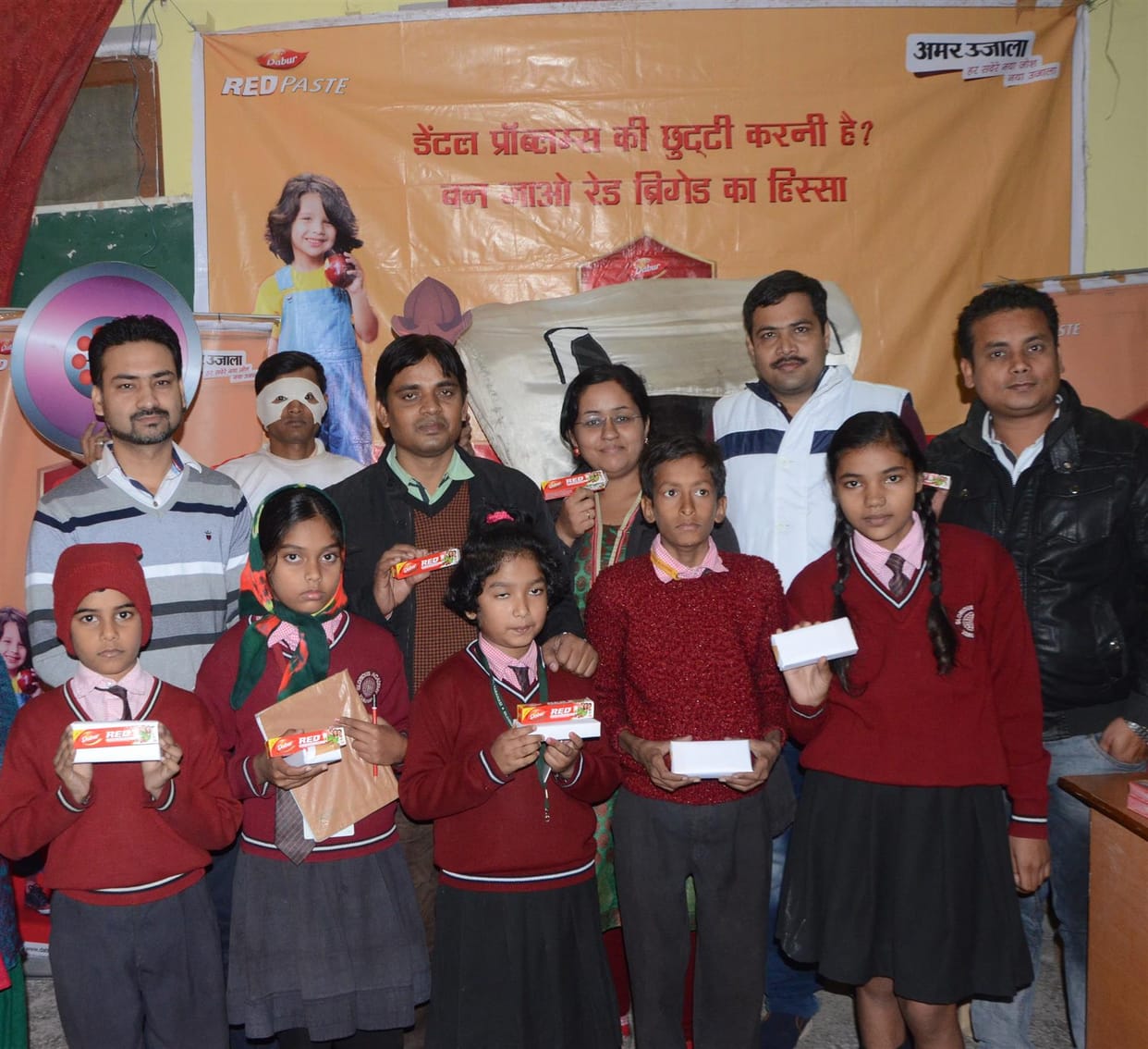 amar ujala and dabur red paste organise dental camp