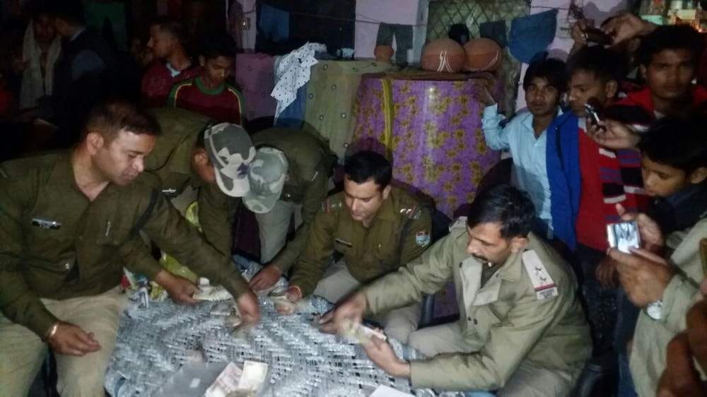 women find old currency in forest
