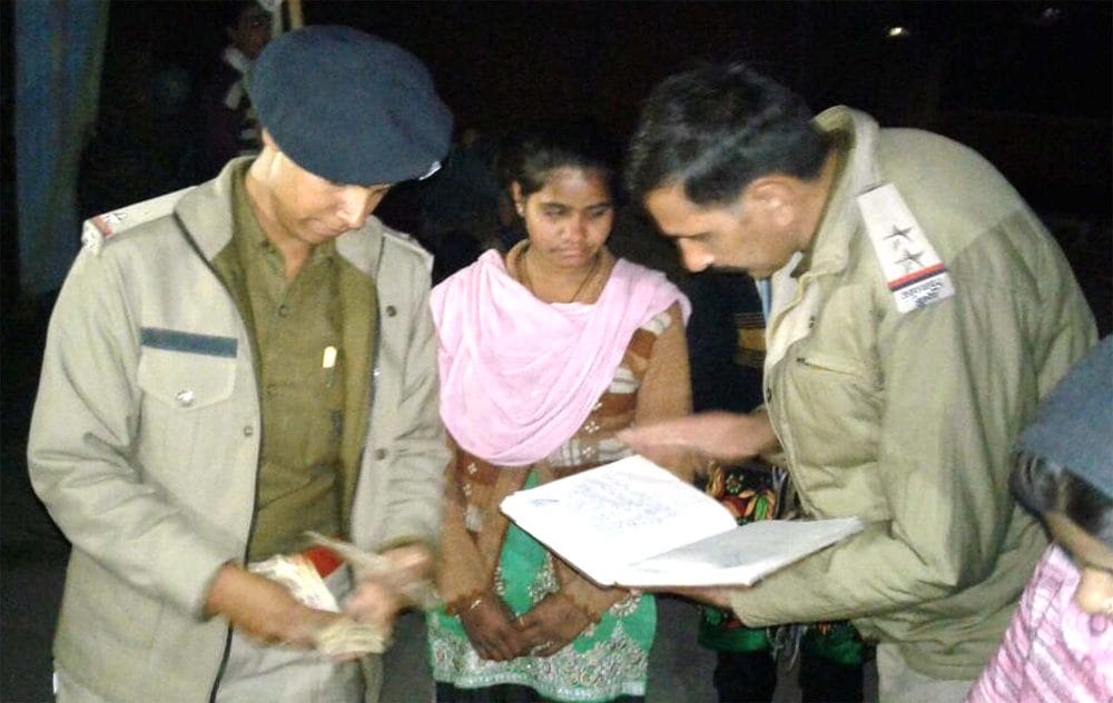 women find old currency in forest