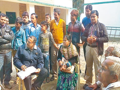 Teacher suspended two accused, arrested