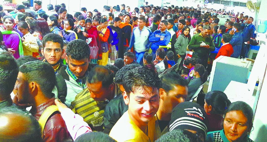 The lack of cash in banks, people still in line