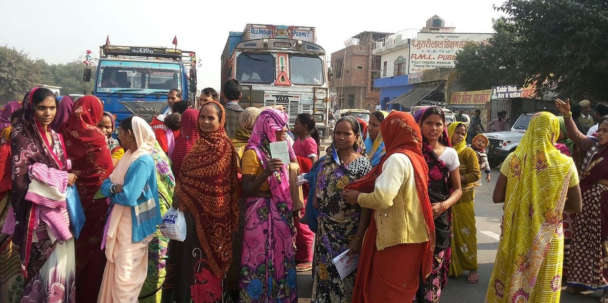 Performance for debt forgiveness, women have jammed highway