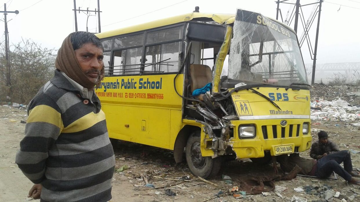 truck crash school bus in fog
