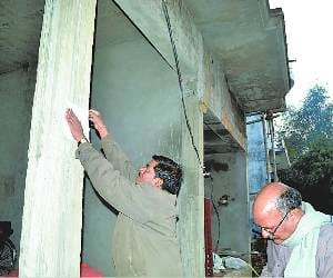 Two construction building overlooking the seal on notice