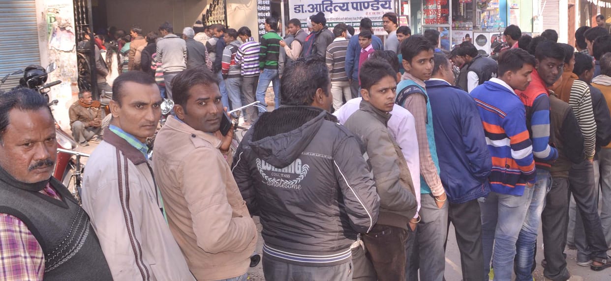 Banks and ATM queue outside intact