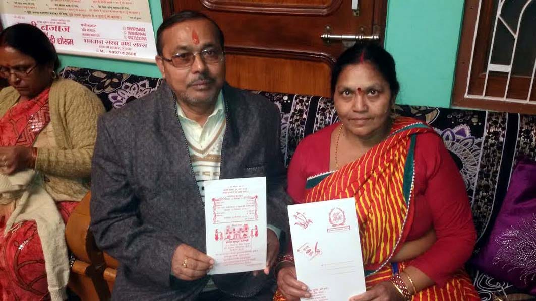 wedding card printed with account number of bride on it