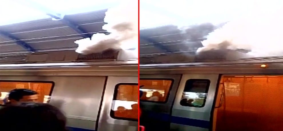 Delhi: Smoke emits from a stationary metro train at Patel Nagar station.
