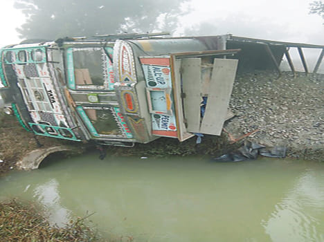 The truck overturned in the fog