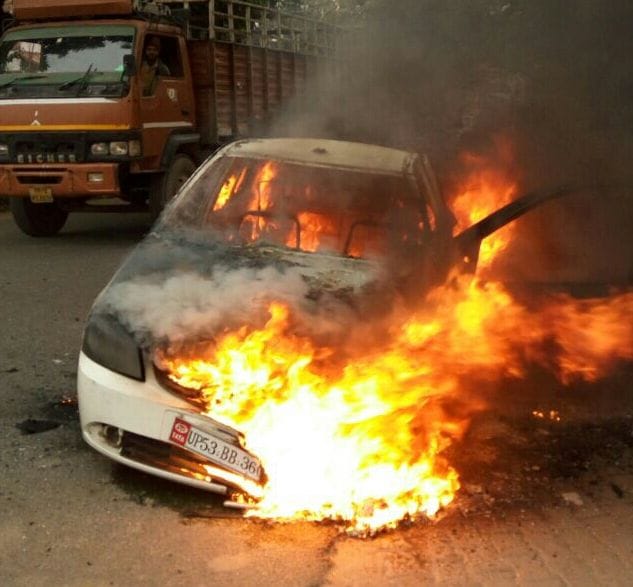 Moving car on fire, fear