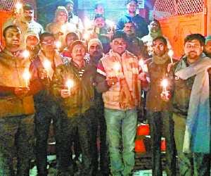 Candles burn expressed sorrow at the death of teacher