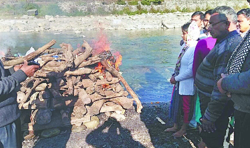 The father o daughters lit the pyre