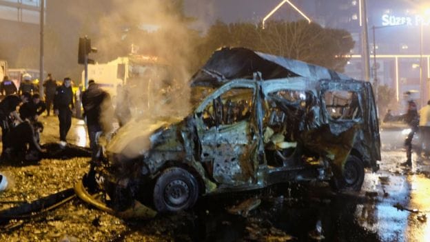 Turkey's interior minister says Istanbul bombings kill 29 and wound 166