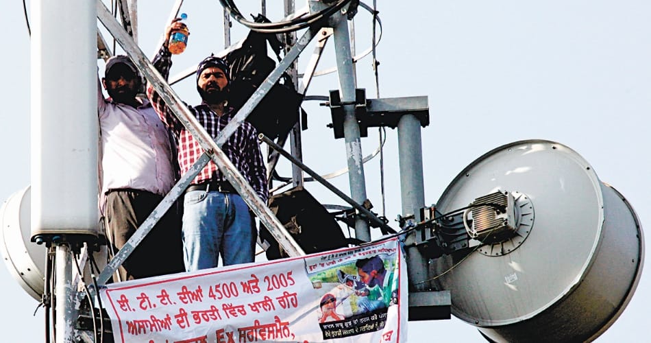 two ett teachers sitting on tower since 38 days, will come down due to meeting with chief minister