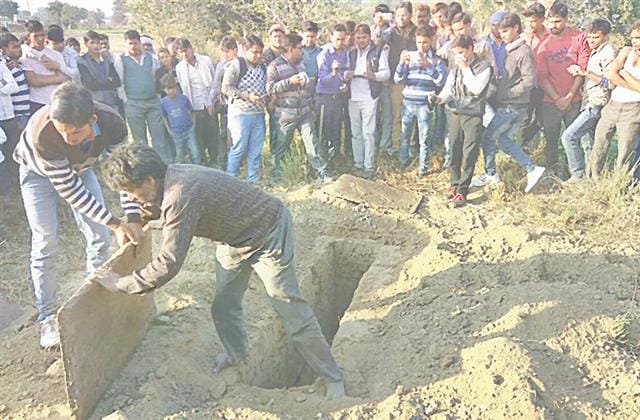 Fourteen months later carved tomb for autopsy