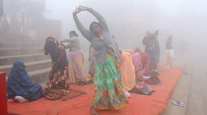 peoples participates in Yoga at Assi ghat in varanasi