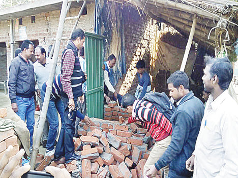 The demolition of 68 substandard toilet