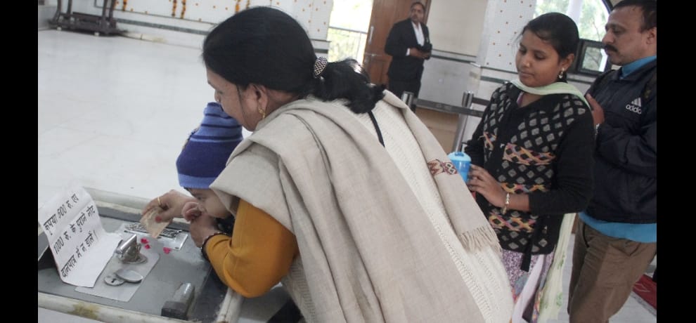 new way to charity to Sai Baba temple cashless swipe machines help