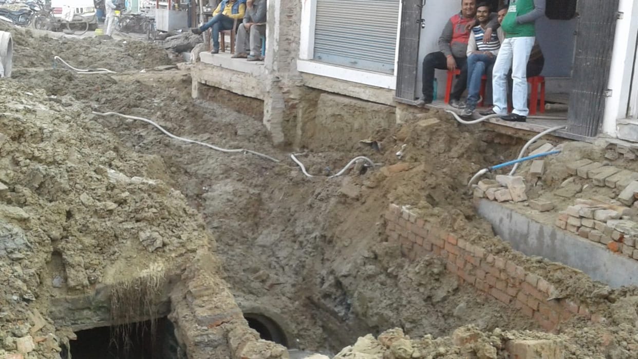 The drain laying new sewer line break