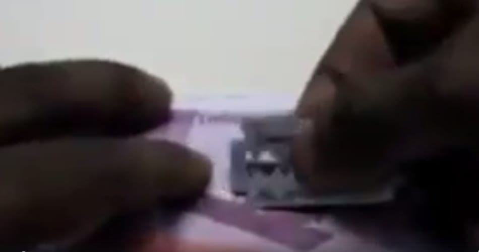 a man found out nano gps chip in 2000 rupee note, video viral on social media