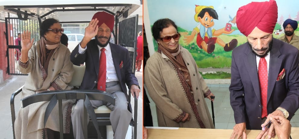 Between his posters Flying Sikh Milkha Singh arrived to vote