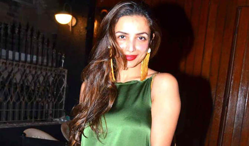 malaika arora seen in her backless dress