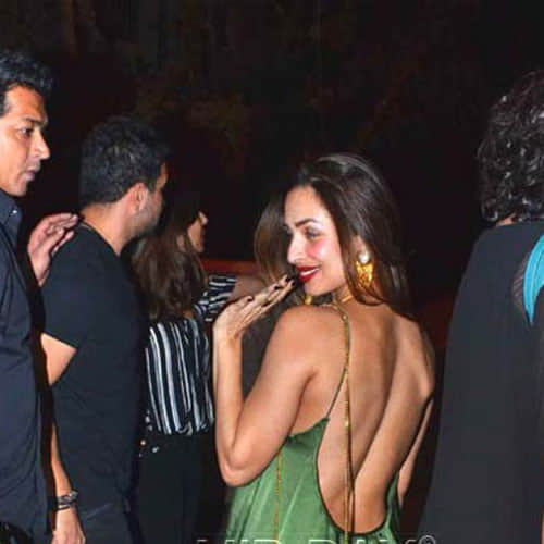 malaika arora seen in her backless dress